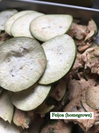 sliced freeze-dried feijoa - thin circles of light green or light brown (there are two varieties). homegrown in lower hutt.