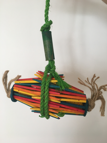 colourful bundle of wood sticks tied together with jute rope
