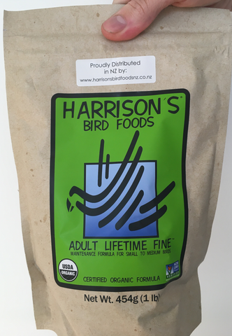 front of the green bag of Harrison's Adult Lifetime Fine premium pellets for parrots, suitable for smaller birds