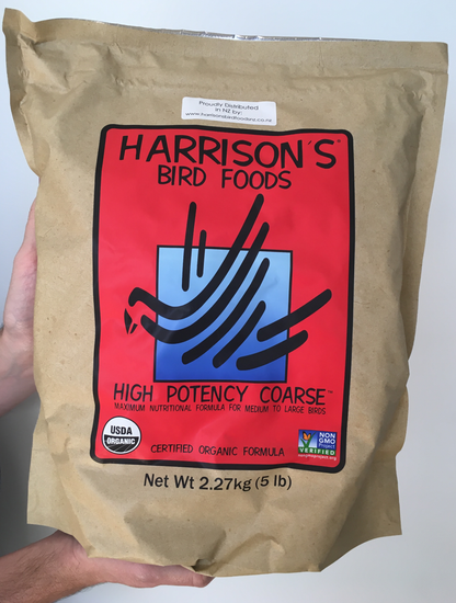 front of the large red bag of Harrison's High Potency Coarse premium pellets for parrots, suitable for larger birds with higher nutritional needs