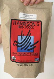 front of the small red bag of Harrison's High Potency Coarse premium pellets for parrots, suitable for larger birds with higher nutritional needs