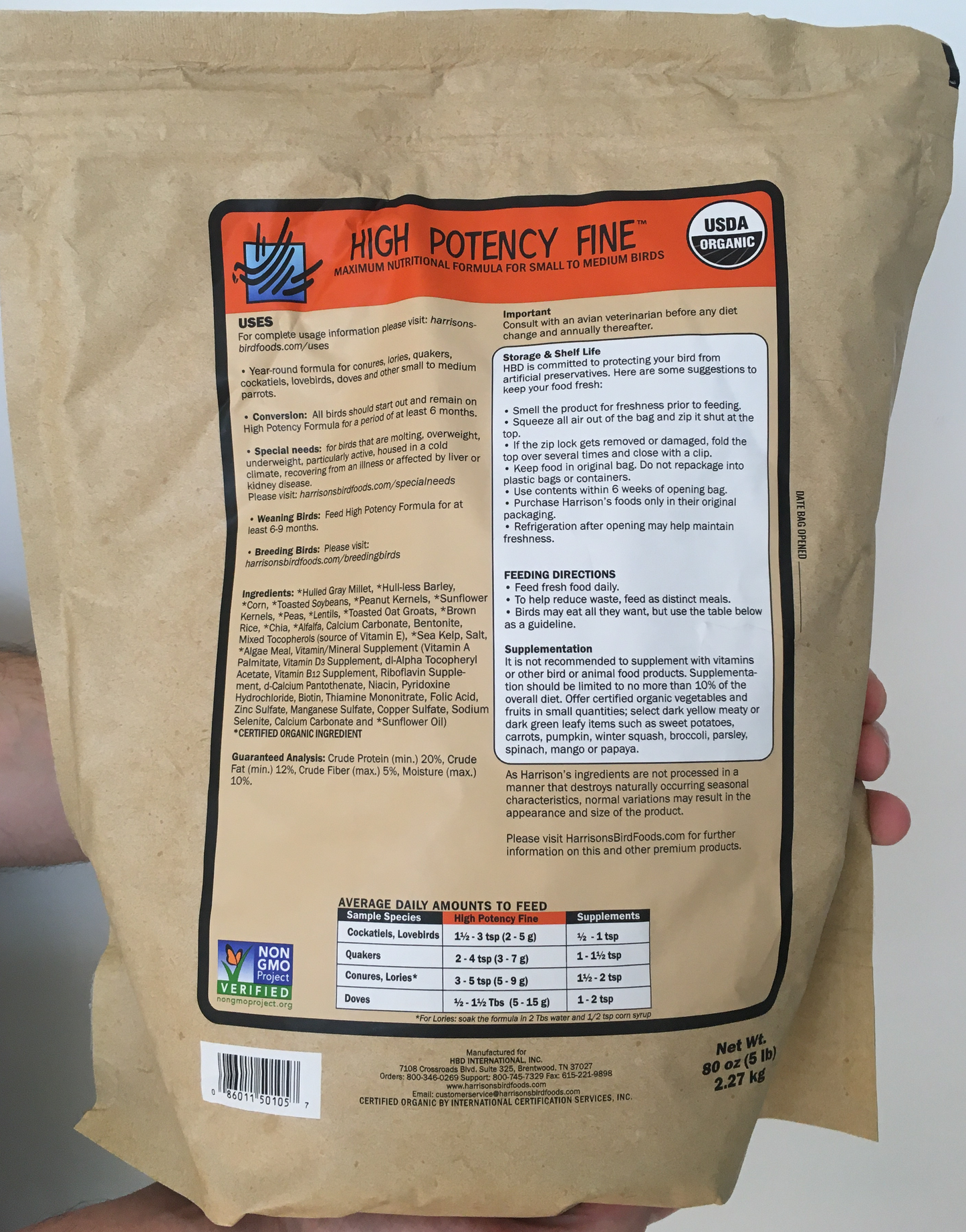 back of the large orange bag of Harrison's High Potency Fine premium pellets for parrots, suitable for smaller birds with higher nutritional needs, with feeding instructions