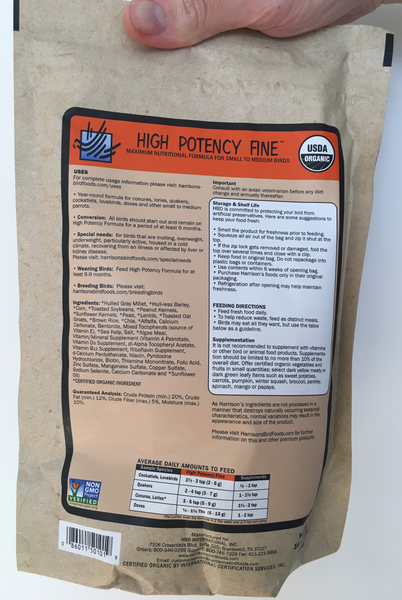 back of the small orange bag of Harrison's High Potency Fine premium pellets for parrots, suitable for smaller birds with higher nutritional needs, with feeding instructions