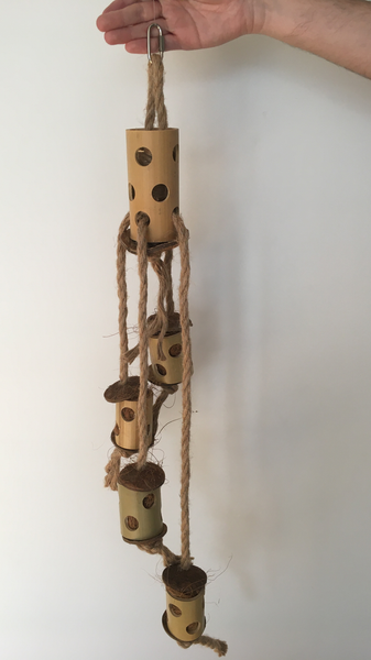 overall view to the totem tower parrot toy - jute rope, wooden blocks, and coconut pieces