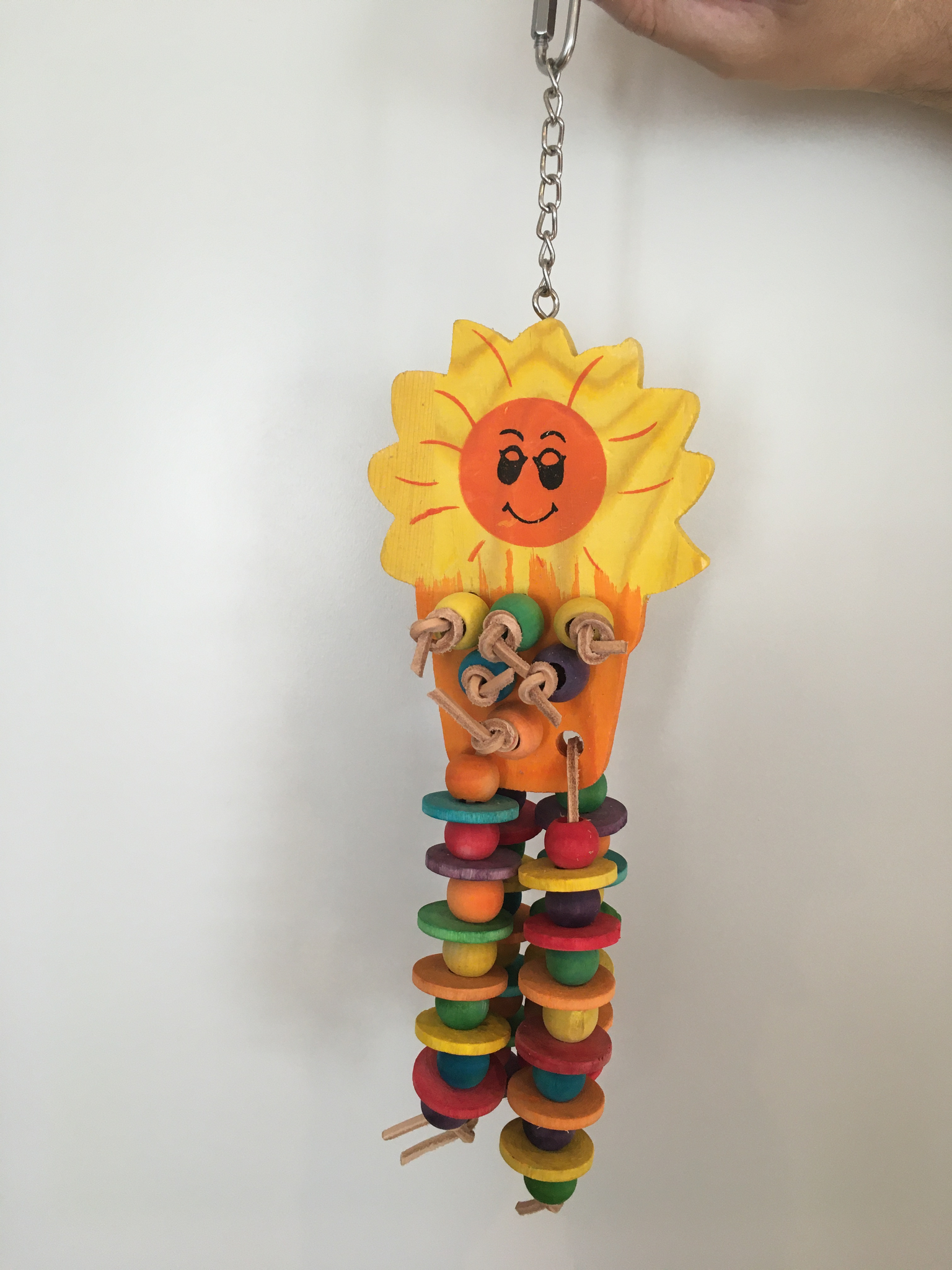 sunflower toy for parrots, bright yellow with rainbow dangles